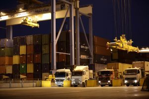 Trucks-picking-up-and-dropping-off-containers-300x200